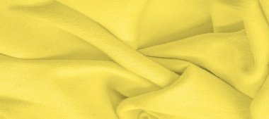 Doku arka plan deseni. Örme kumaş Sarı. Batma, xan