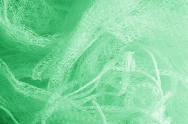 Örgü yeşilli kumaş. Sizin için ruhani parlaklık bir çizgi ekleyin