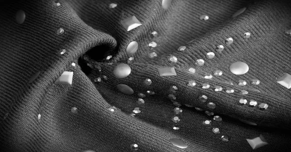 Текстура, рисунок, фон. Женский серый шерстяной шарф с металлом — стоковое фото