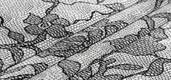 Textur, Hintergrund, Muster. Seide weißer Stoff mit Spitzenmuster — Stockfoto