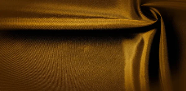 Doku, arka plan, desen. altın sarısı ipek kumaş panorami — Stok fotoğraf
