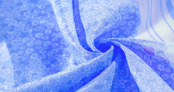 Textura, patrón, tela de seda azul sobre un fondo blanco, flor —  Fotos de Stock
