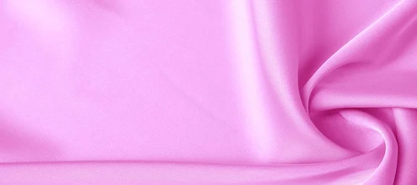 Υφή. Ροζ μεταξωτό ύφασμα. λαμπρή λάμψη και χαρακτηριστική — Φωτογραφία Αρχείου