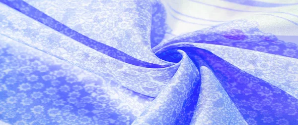 Textur, mönster, blått sidentyg på vit bakgrund, blomma — Stockfoto