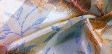 doku, arka plan. Metalik ipek kumaş. Ele eklemek için ideal