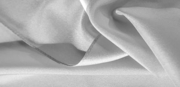 Textura, pozadí, vzorek, hedvábná tkanina bílé barvy. Toto s — Stock fotografie