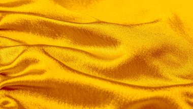 sarı doku ile bebek bezi. Bu çok yönlü kumaşın birçok kullanımı vardır,