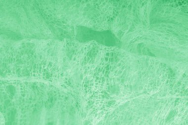 Örgü yeşilli kumaş. Sizin için ruhani parlaklık bir çizgi ekleyin