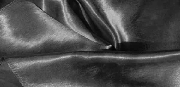Textura, fundo, padrão, tecido de seda em preto. Este adorável — Fotografia de Stock
