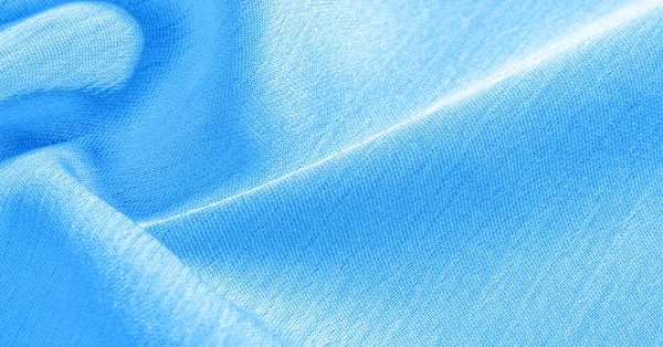 Hintergrund, Muster, Textur, Tapete, blauer Seidenstoff. es ha — Stockfoto