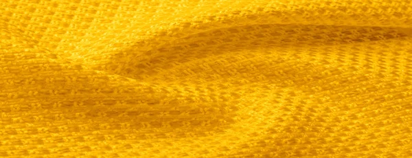 Textura de fondo, patrón. Tela amarilla con lentejuelas metálicas —  Fotos de Stock