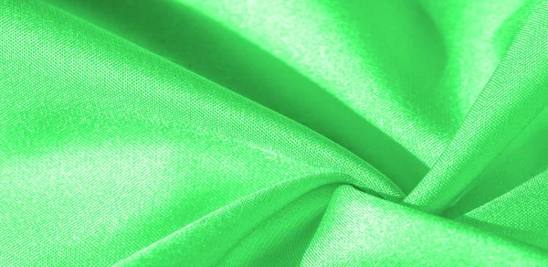 Texture, background, pattern, silk fabric of green color. This s — Stock Photo, Image