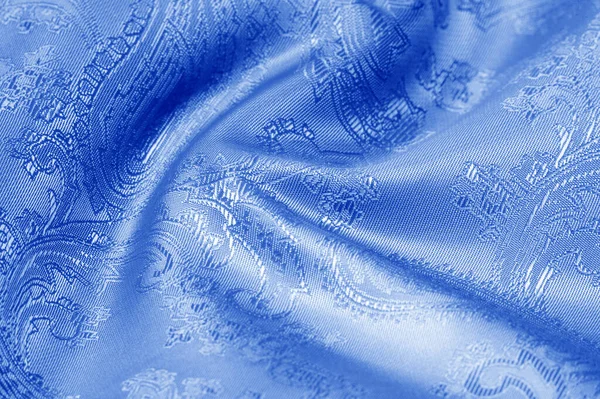 Textura, fondo, patrón. La tela es azul seda. Lujo en —  Fotos de Stock