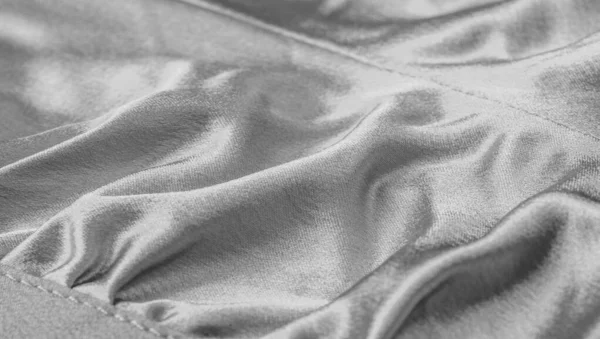 Patterned fabric with gray texture. This versatile fabric has ma — Stock Photo, Image