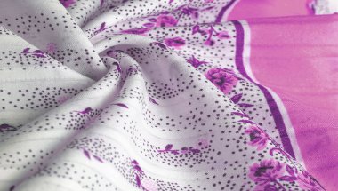 Doku arka planı, kadın şal. beyaz bir bac sarı çiçekler