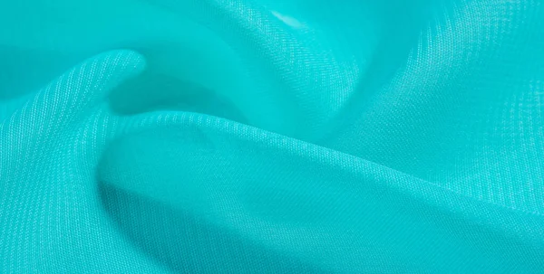 Bakgrunnsmønster i blått silkestoff. denne silkeorganzaen – stockfoto