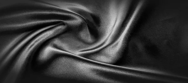 Texture, background, pattern. Black silk fabric. It is black and — Stock Photo, Image