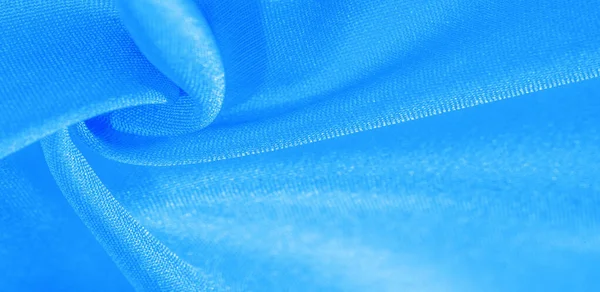Tekstura, tło, wzór, tkanina jedwabna w kolorze niebieskim. Ten jedwab jest — Zdjęcie stockowe