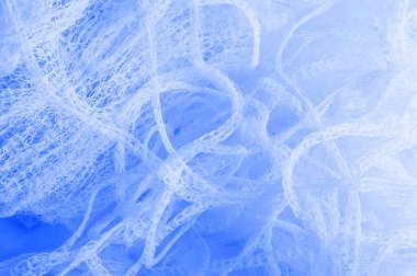 Doku arka planı, desen. bir örgü mavi kumaş, güzel bir 