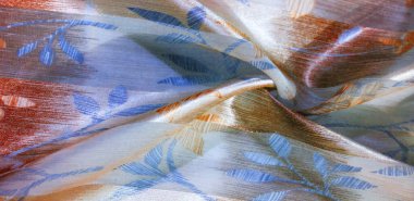 doku, arka plan. Metalik ipek kumaş. Ele eklemek için ideal