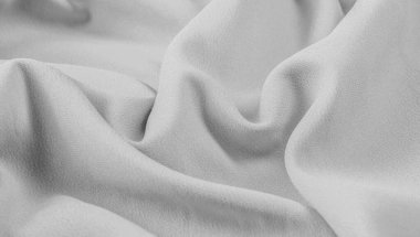 Gri doku ile desenli kumaş. Bu çok yönlü kumaş ma vardır