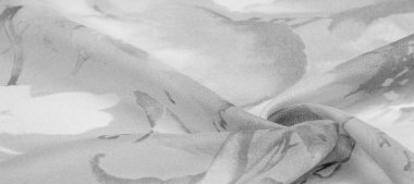 Doku, arka plan, büyük desenli ince yarı saydam ipek.