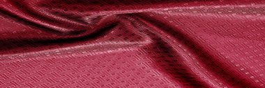 Arka plan dokusu, desen. Küçük kareli kırmızı ipek kumaş. Klasik bir görünüm, bunu tasarımcı koleksiyonunuza ekleyin. Kırmızı bir pist arıyorsan, nasıl gidileceğini öğrenebilirsin..