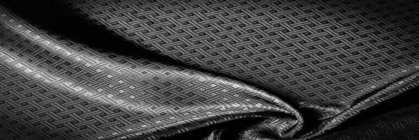 Background texture, pattern. Black silk fabric with a small chec — Stock Photo, Image