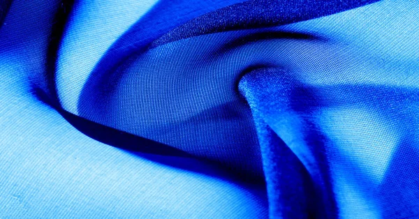 Background, pattern, texture, wallpaper, blue silk fabric. Add a