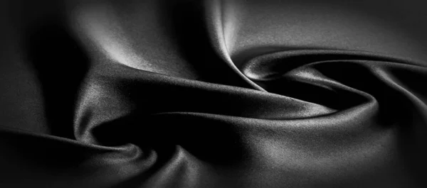 Texture, fond, motif. Tissu en soie noire. Il est noir et — Photo