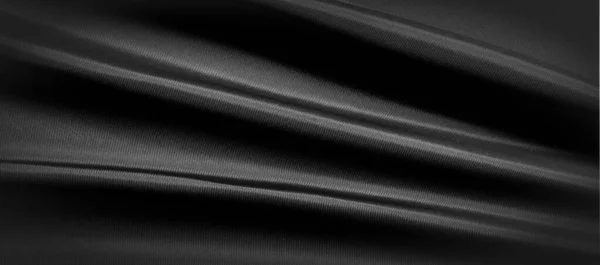 Texture, background, pattern. Black silk fabric. It is black and — Stock Photo, Image