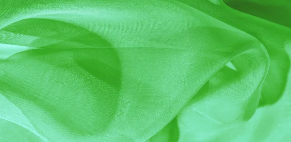 Texture of green silk fabric. It is also perfect for your design