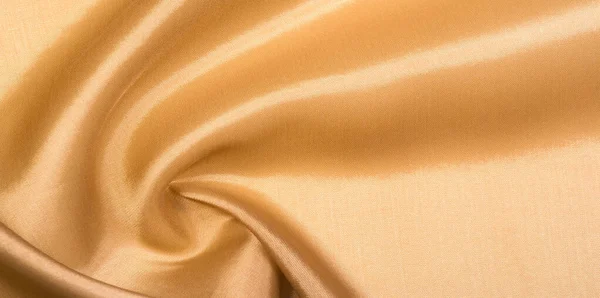 Figure, background, pattern. Light brown silk fabric. This is th — Stock Photo, Image