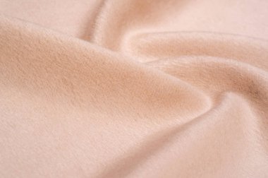Doku, arka plan, desen. Kumaş sıcak yün, bej, pastel sl