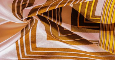 Doku, arka plan, sarı çizgili desenli ipek kumaş. 