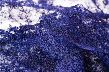 Doku, desen, beyaz bir arka plan üzerinde dantel mavi. Narin ve 