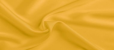 arka plan dokusu, desen. Sarı ipek kumaş. Çok hafif bir fa