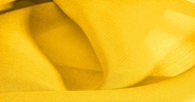 Doku arka planı, desen. kumaş; sarı altın işlemeli kumaş.