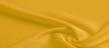 arka plan dokusu, desen. Sarı ipek kumaş. Çok hafif bir fa