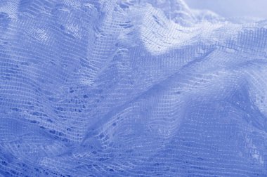 Doku, arka plan mavi tül. Hacim, yetenek veya ayrıntılı d ekleme