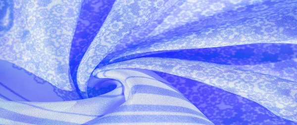 Textura, padrão, tecido de seda azul em um fundo branco, flor — Fotografia de Stock