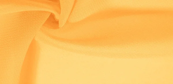 Μοτίβο φόντου υφής. Κίτρινο μεταξωτό ύφασμα με ένα λεπτό χαλάκι — Φωτογραφία Αρχείου