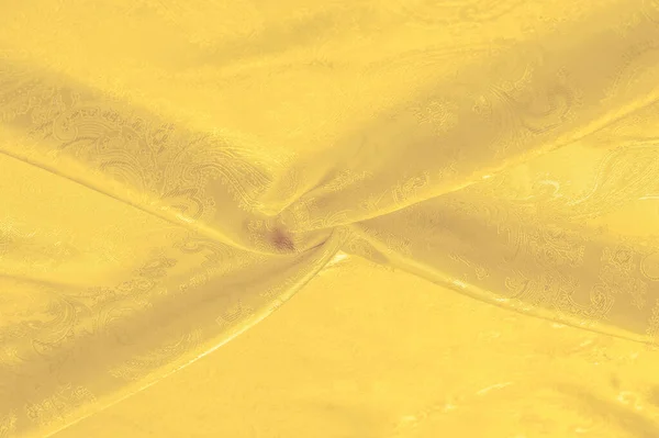 Tekstur, latar belakang, kain sutra berwarna kuning. Stam kuning ini — Stok Foto