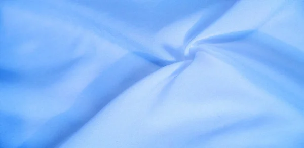 Текстура фону, візерунок. Шовкова синя тканина. Від Telio, це — стокове фото
