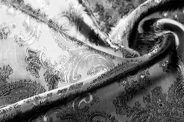 Textura, fondo, tela gris acero negro con un paisley patt —  Fotos de Stock