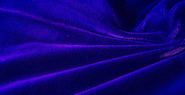 Picture. Texture, background. The velvet fabric is blue, the ric — Stock Photo, Image