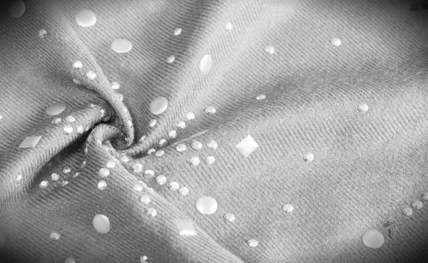 Tekstura, wzór, tło. Kobiet szary wełniany szalik z metalu — Zdjęcie stockowe