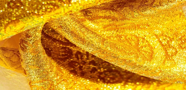 Tekstura, tło, wzór. tkaniny żółte złoto Brokat. Organz — Zdjęcie stockowe
