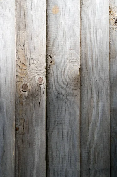 Texture, sfondo, pattern. Recinzione di barre di legno, non dipinte , — Foto Stock