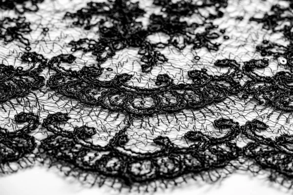 Tekstur, pola, renda kain hitam pada latar belakang putih. Th — Stok Foto